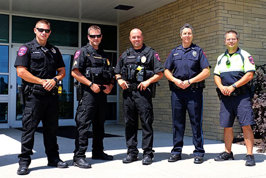 Members of the Papillion Police Department will be wearing new uniforms. Department members show the different options for officers. Pictured, from left, is Andy Mahan, Kurt McClannan, Patrick Nastase, Kathy Mattern and Joshua Black.
